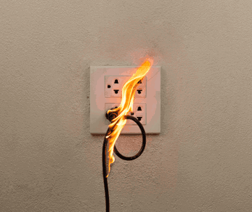 Flames engulf an electrical cord